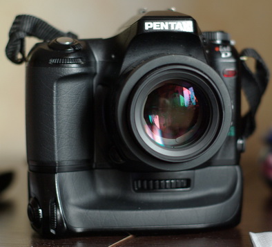 Pentax *ist D body with grip.