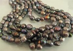 Невероятно красивое ожерелье из черных жемчужин различных оттенков Таити