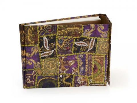 9781439710524_tribal_embroidery_sequined_garnet_guest_book_wrap.jpg