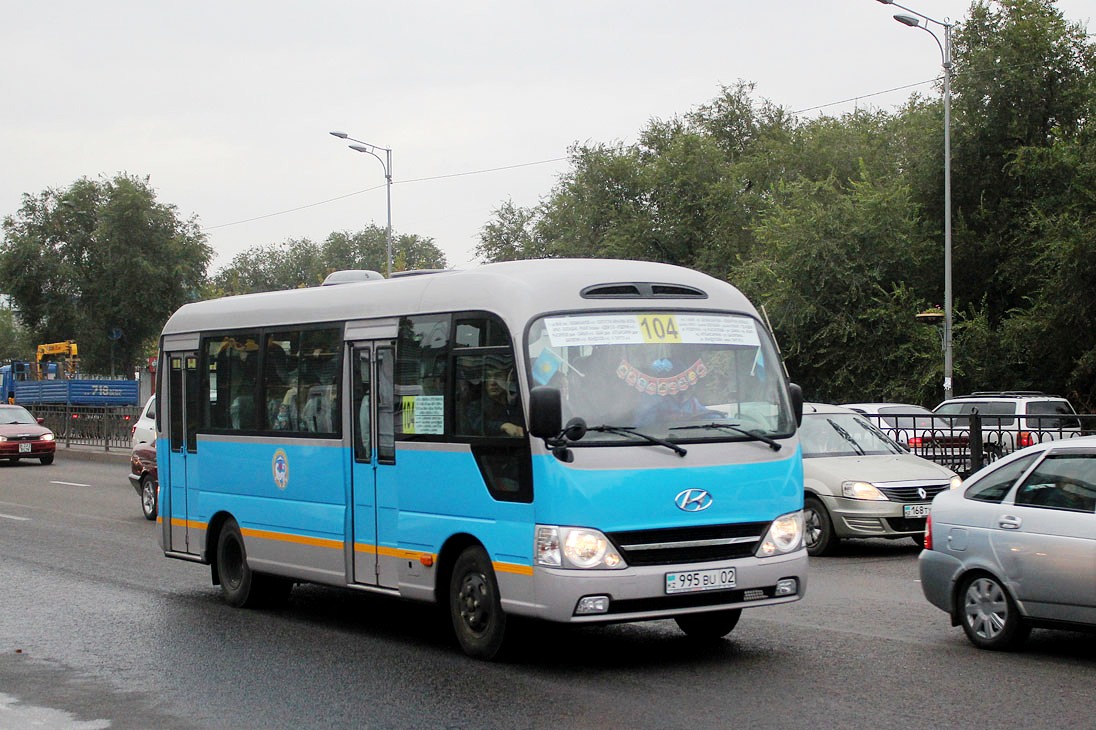 Автобус 104 б класса серпухов. Автобус Хендай Алматы. Школьные автобусы Hyundai Trans Almaty. E-County.
